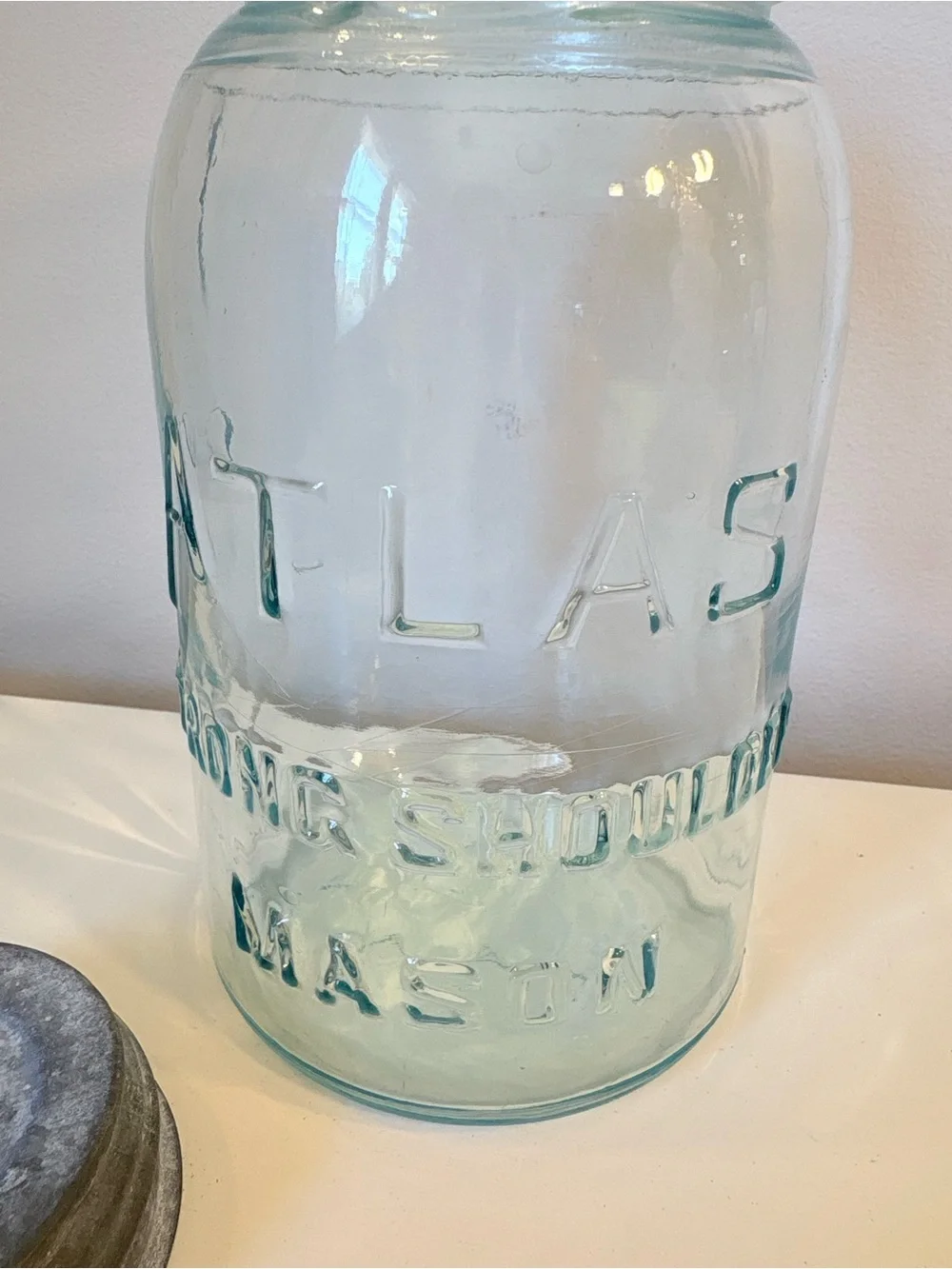 Atlas “strong shoulder” Embossed Blue Glass Mason Jar with Metal Lid